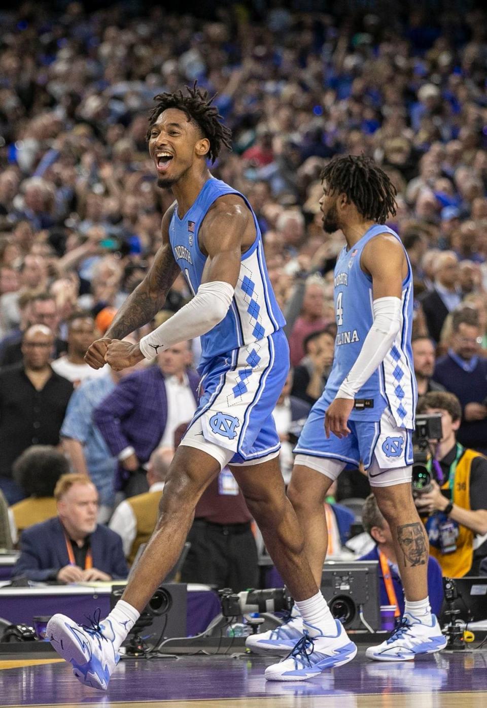 North Carolinas Leaky Black (1) and R.J. Davis (4) celebrate their 81-77 victory over Duke as time expires during the NCAA Final Four semi-final on Saturday, April 2, 2022 at Caesars Superdome in New Orleans, La.