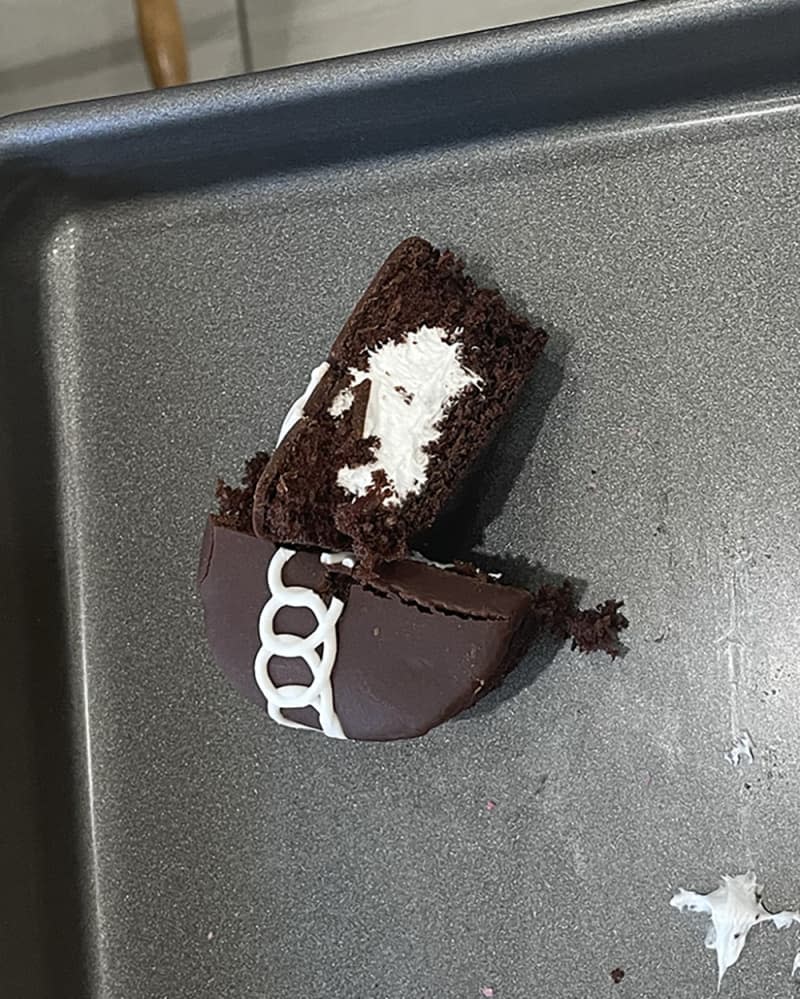 Chocolate Cupcake Hostess snack cut open on baking sheet