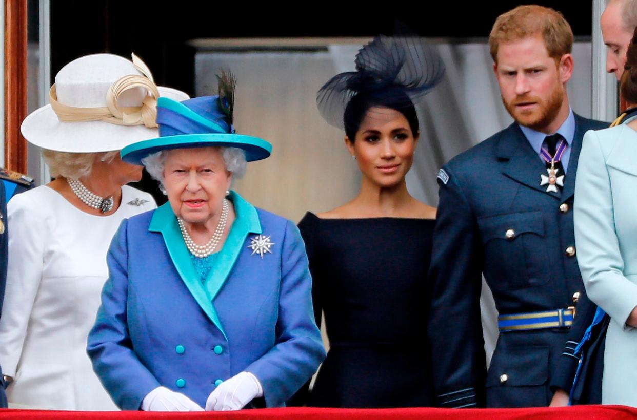 <p>Royal family on  the Buckingham Palace balcony watching a military fly-past to mark the centenary of the Royal Air Force.</p> (AFP via Getty Images)