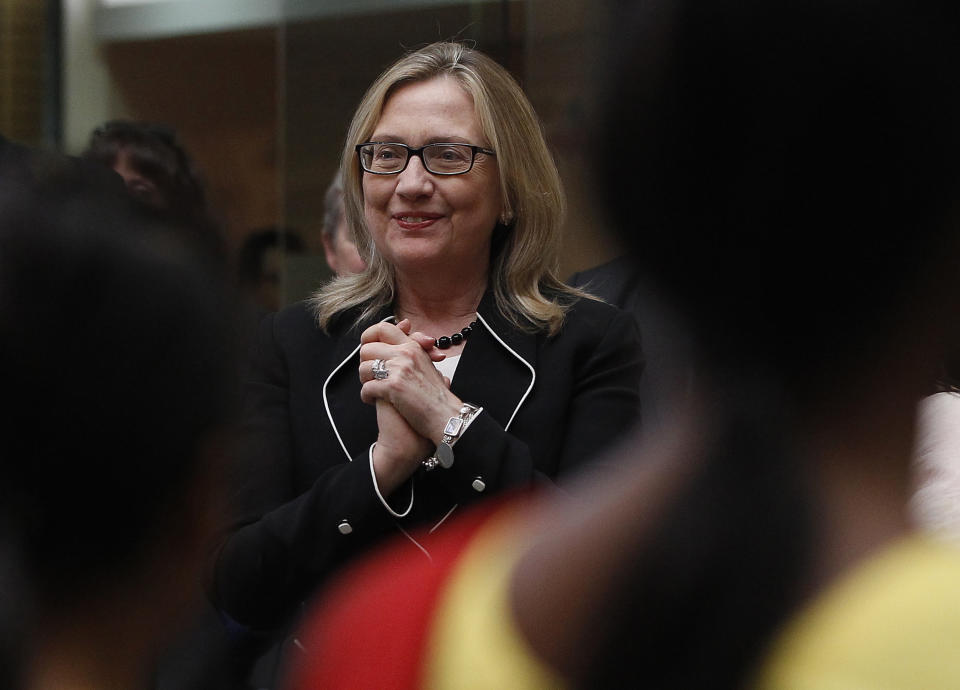 U.S. Secretary of State Hillary Rodham Clinton watches a performance during an Anti-Human Trafficking event in Kolkata, Sunday, May 6, 2012. (AP Photo/Shannon Stapleton, Pool)