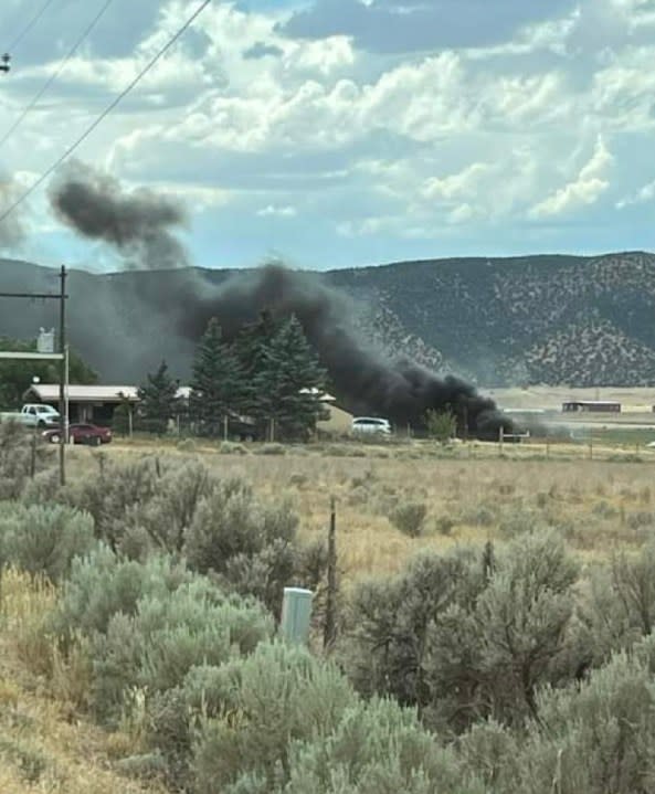 A structure fire in Iron County on Saturday, July 20, 2024, spread to the surrounding area. First responders from several agencies responded to fight the fire. (Courtesy: Iron County Sheriff's Office)