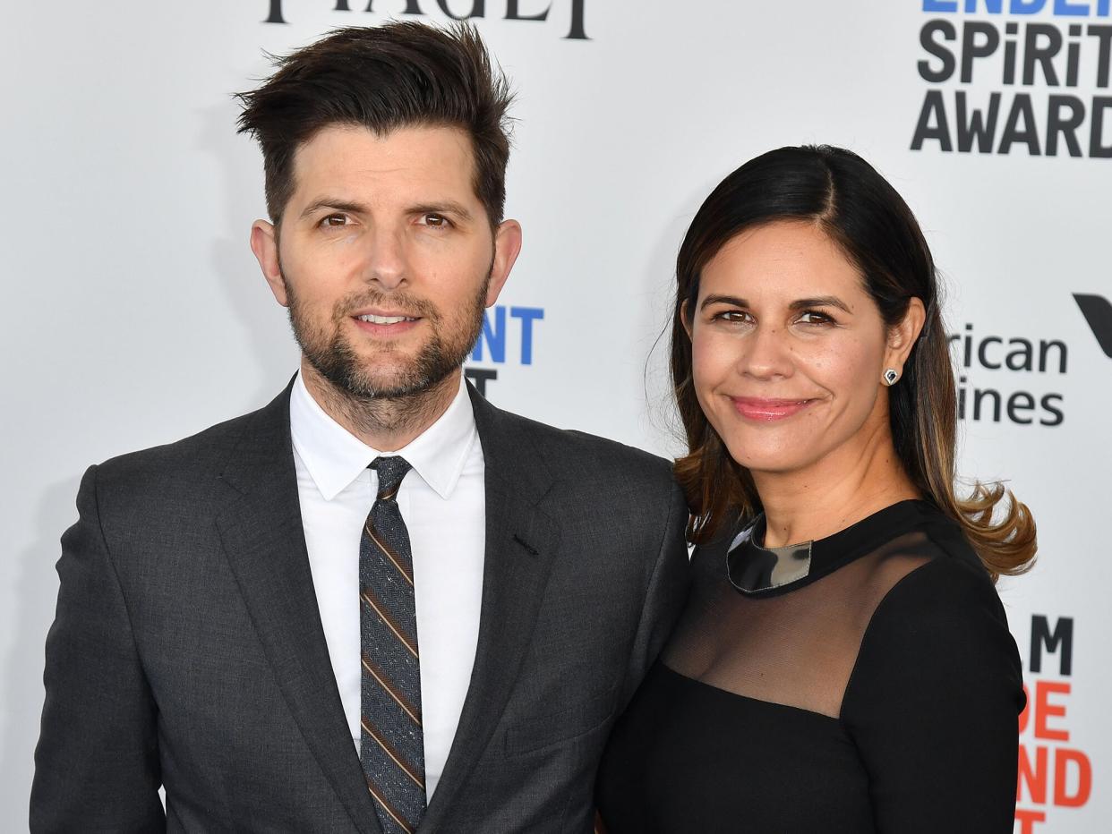 Adam Scott (L) and producer Naomi Scott attend the 2017 Film Independent Spirit Awards at the Santa Monica Pier on February 25, 2017 in Santa Monica, California