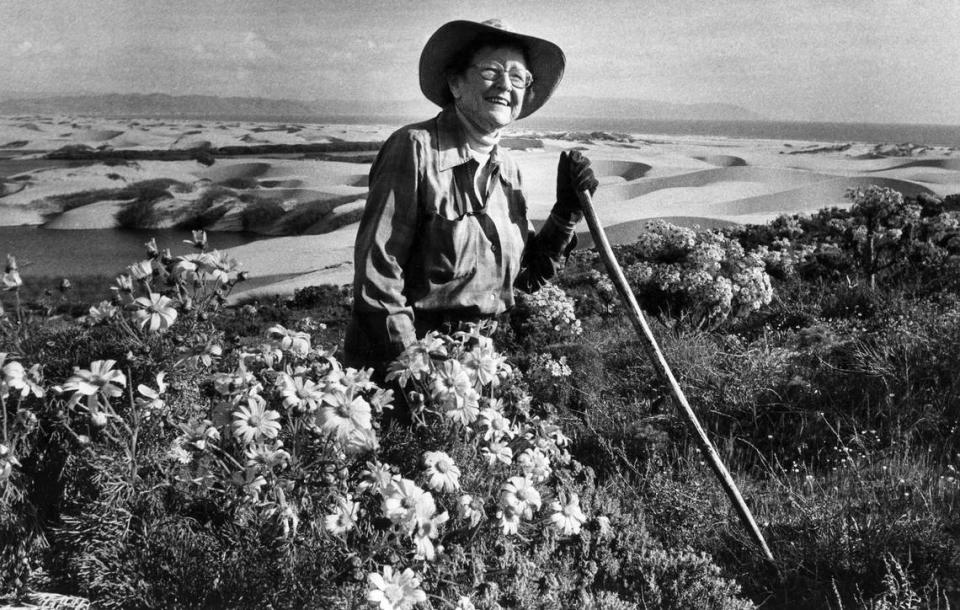 Kathleen Goddard Jones lead walks to Coreopsis Hill at the Guadalupe Dunes near Oso Flaco Lake in March 1985.