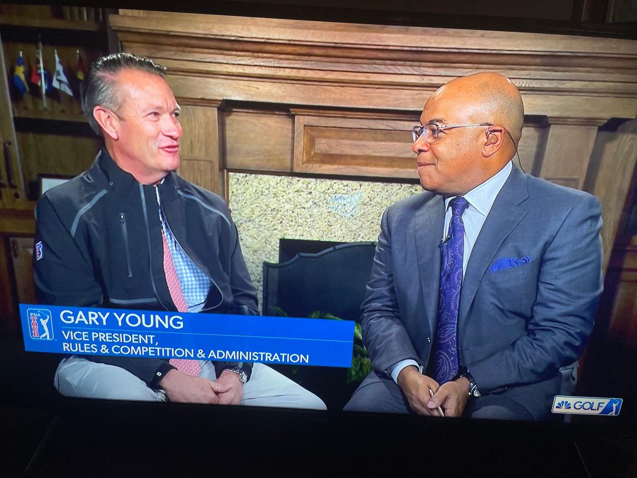 Gary Young, left, is interviewed by Mike Tirico on The Golf Channel during the Players Championship.