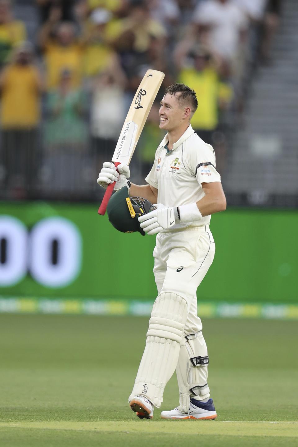 Australia's Marnus Labuschagne celebrates scoring 100 runs during play against New Zealand in their cricket test in Perth, Australia, Thursday, Dec. 12, 2019. (AP Photo/Trevor Collens)