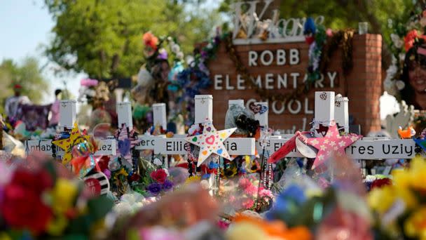 PHOTO: Crosses, flowers and other memorabilia form a make-shift memorial for the victims of the shootings at Robb Elementary school in Uvalde, Texas, July 10, 2022. (Eric Gay/AP)