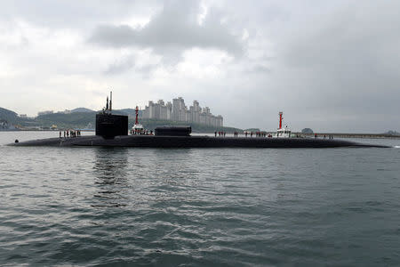 FILE PHOTO: The Ohio-class guided-missile submarine USS Michigan arrives for a regularly scheduled port visit while conducting routine patrols throughout the Western Pacific in Busan, South Korea, April 24, 2017. Jermaine Ralliford/Courtesy U.S. Navy/Handout via REUTERS