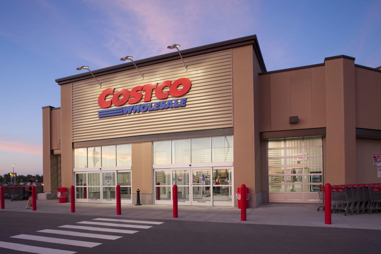 Drummondville,Quebec,Canada-July 12,2013:Costco Wholesale storefront in Drummondville at dusk.Costco Wholesale operates an international chain of membership warehouses, carrying brand name merchandise at substantially lower prices.