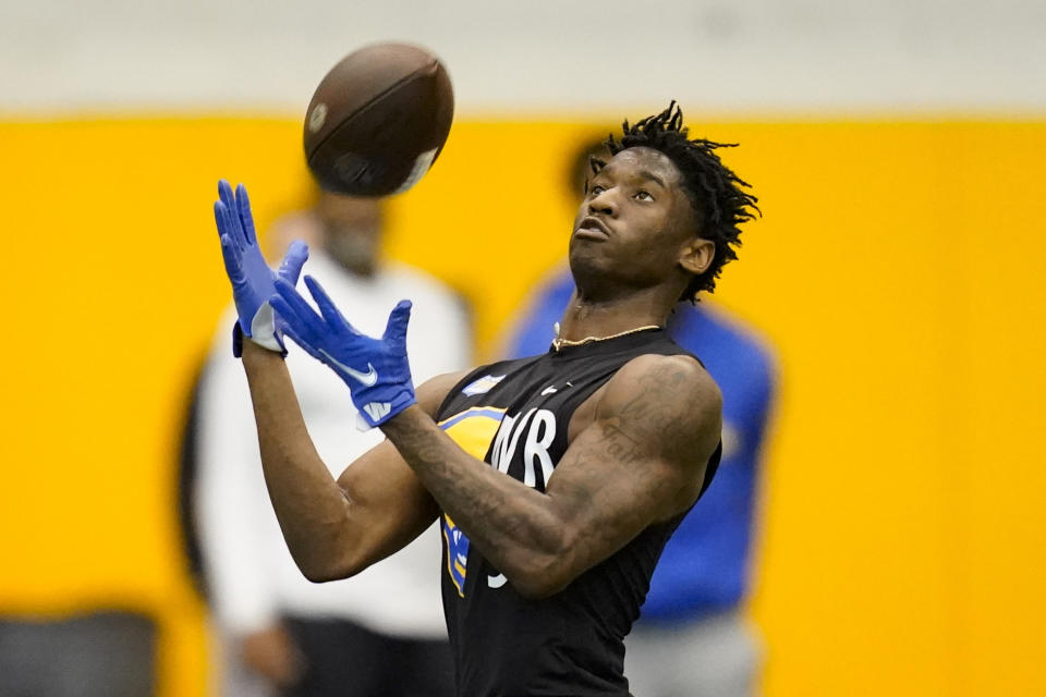 FILE - Pittsburgh wide receiver Jordan Addison (3) makes a catch in drills during Pittsburgh's football pro day, Monday, March 21, 2022, in Pittsburgh. Addison was the 2021 winner of the Fred Biletnikoff Award given annually to college football’s top receiver. With former Pitt quarterback Kenny Pickett heading to the NFL’s Pittsburgh Steelers and offensive coordinator Mark Whipple taking the same position at Nebraska, Addison headed west to Southern California. (AP Photo/Keith Srakocic, File)