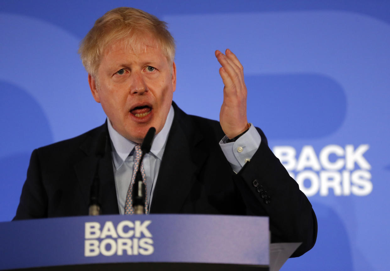 Britain's Conservative Party lawmaker Boris Johnson gestures as he speaks during the official launch of his leadership campaign, in London, Wednesday June 12, 2019. Boris Johnson solidified his front-runner status in the race to become Britain's next prime minister on Tuesday, gaining backing from leading pro-Brexit lawmakers.(AP Photo/Frank Augstein)