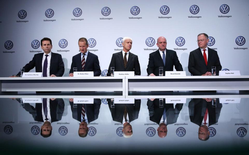 (L-R) VW executives Karlheinz Blessing, Herbert Diess, Matthias Mueller, Bernd Osterloh and Stephan Weil - RONNY HARTMANNRONNY HARTMANN/AFP/Getty Images