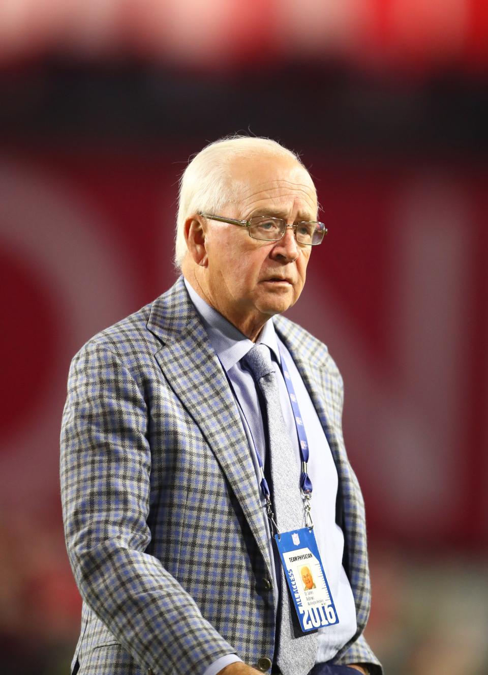 Dr. James Andrews, shown at a Washington-Arizona NFL game in Phoenix in 2016, has performed Tommy John surgery on numerous athletes.