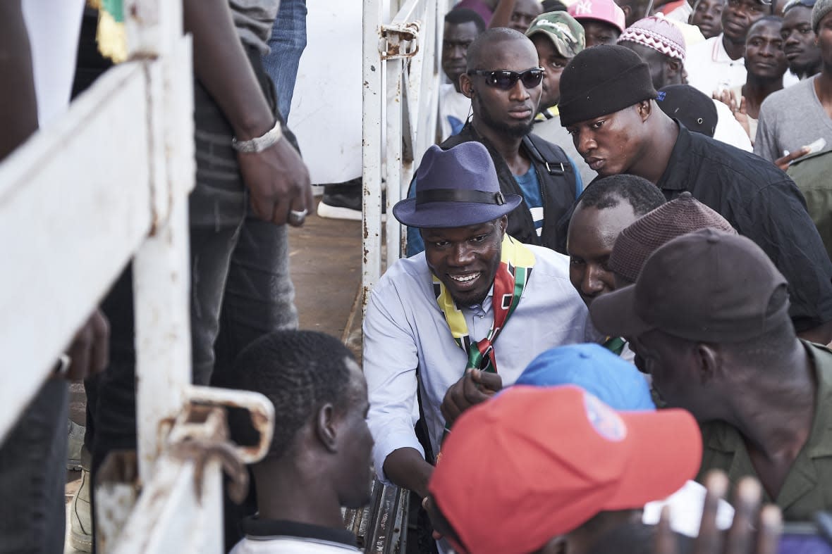 DAKAR, SENEGAL – JUNE 21: Opposition leader and former presidential candidate Ousmane Sonko arrives at a protest against against President Macky Sall after a possible corruption case was discovered by a BBC investigation earlier this month, on June 21, 2019 in Dakar, Senegal. The investigation published by BBC Panorama and Africa Eye found that BP had agreed to pay Timis Corporation, run by the Romanian-Australian business tycoon Frank Timis, between $9bn (£7bn) and $12bn in royalty payments for its stake in the blocks. It alleged that Timis Corporation made a secret payment of $250,000 to a company run by the president’s brother, a claim that both the President’s brother, Aliou Sall and The Timis Corporation have denied. (Photo by Xaume Olleros/Getty Images)