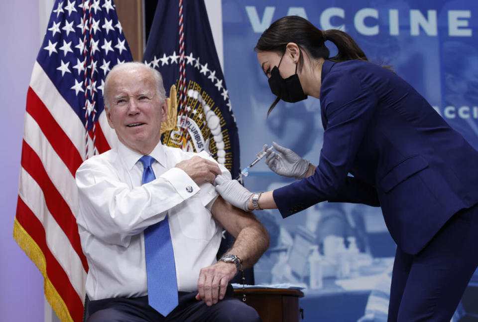 U.S. President Joe Biden receives his updated COVID-19 booster in the South Court Auditorium at the White House campus on October 25, 2022 in Washington, DC. (Photo by Anna Moneymaker/Getty Images)