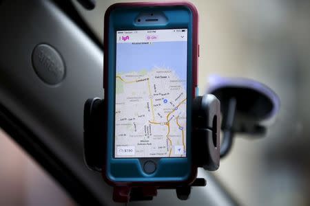 A smartphone app for Lyft drivers is seen during a photo opportunity in San Francisco, California February 3, 2016. REUTERS/Stephen Lam