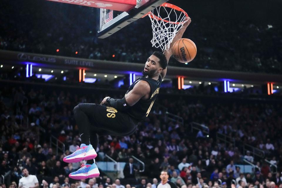 Cavaliers guard Donovan Mitchell dunks during the first half against the New York Knicks on Jan. 24. (AP Photo/Frank Franklin II)