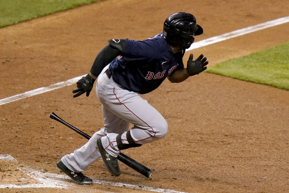 Boston Red Sox's Jackie Bradley Jr. runs after hitting a double to score Xander Bogaerts during the sixth inning of a baseball game against the Miami Marlins, Tuesday, Sept. 15, 2020, in Miami. (AP Photo/Lynne Sladky)