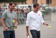 Roger Federer and Rafael Nadal arrive for a photo session ahead of their "Match in Africa" exhibition tennis match in Cape Town