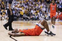 Auburn's Allen Flanigan lays on the court after he was fouled during the first half of an NCAA college basketball game against Missouri Tuesday, Jan. 25, 2022, in Columbia, Mo. (AP Photo/L.G. Patterson)