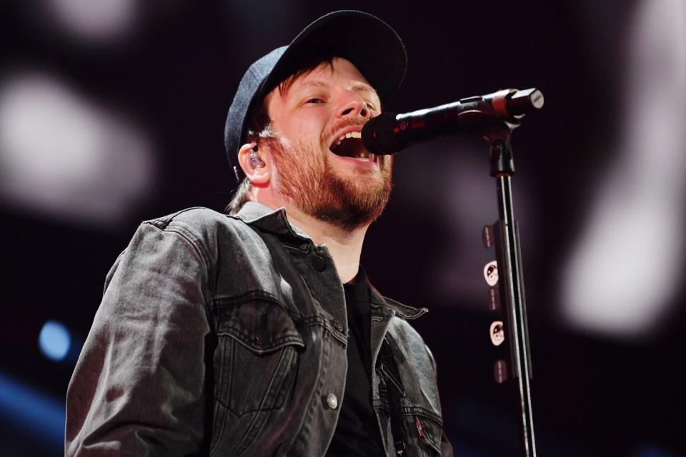 <p>Denise Truscello/Getty</p> Patrick Stump performs with Fall Out Boy in Las Vegas in September 2023