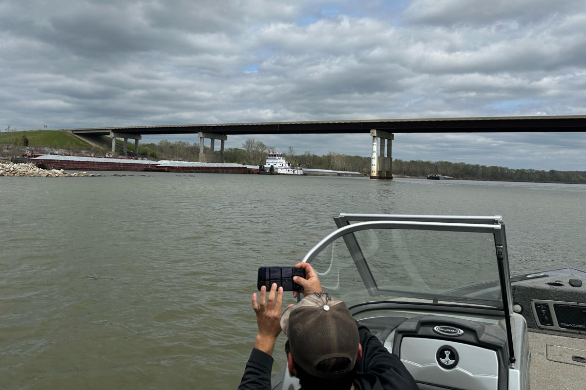 Oklahoma State Patrol says it is diverting traffic after a barge hit a