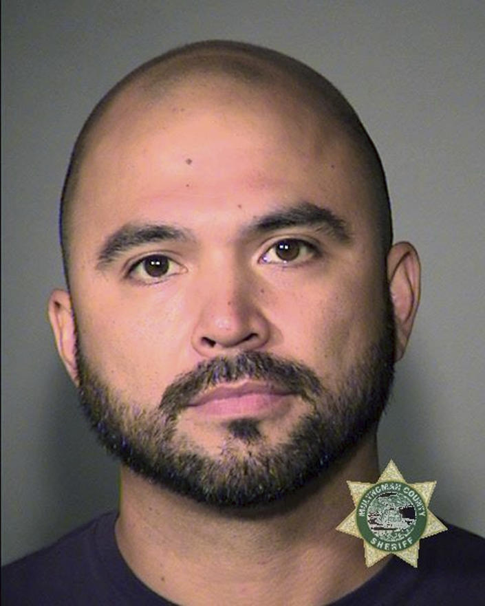 This booking photo provided by the Multnomah County Sheriff's Office shows Patriot Prayer leader Joey Gibson on Friday, Aug. 16, 2019. Authorities arrested Gibson, the leader of the right-wing group, on the eve of a far-right rally that's expected to draw people from around the U.S. to Portland, Ore., on Saturday, Aug. 17 prompting Gibson to urge his followers to "show up one hundred-fold" in response. (Multnomah County Sheriff's Office via AP)