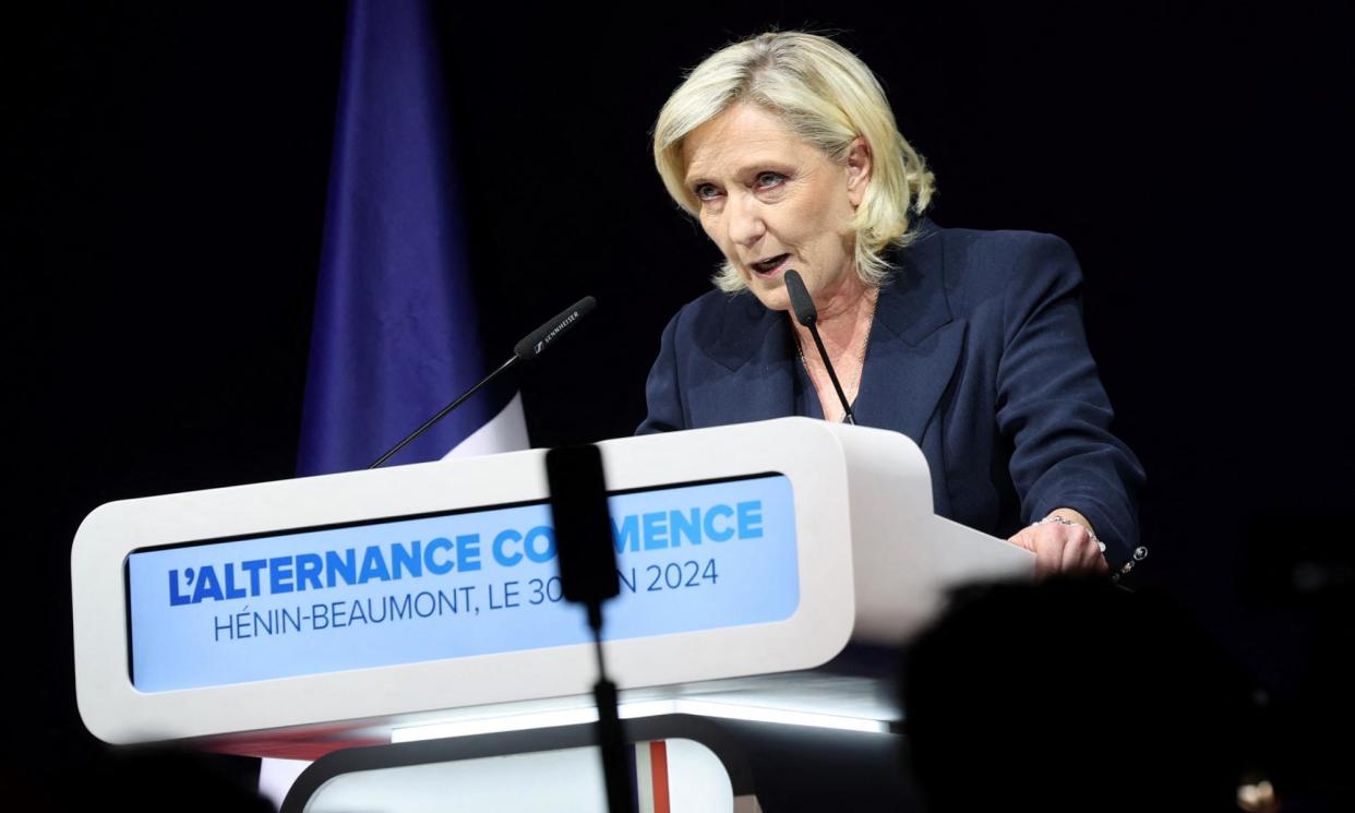 <span>Marine Le Pen gives a speech during the results evening of the first round of the parliamentary elections in Henin-Beaumont, northern France.</span><span>Photograph: François Lo Presti/AFP/Getty Images</span>