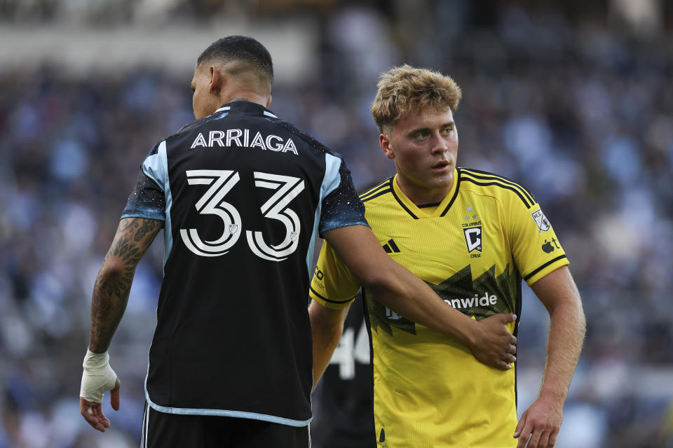 Minnesota United midfielder Kervin Arriaga (33) and Minnesota United midfielder Joseph Rosales (8) react after a play during the second half of an MLS soccer match, Saturday, March 2, 2024, in St. Paul, Minn. The game ended in a 1-1 draw. (AP Photo/Stacy Bengs)