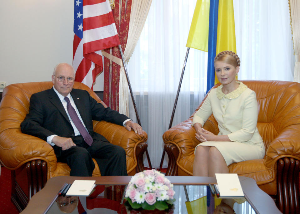 Prime Minister of Ukraine Yulia Tymoshenko with former Vice President Dick Cheney. (ALEXANDER PROKOPENKO/AFP/Getty Images)