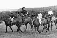 <p>Jacqueline and her children, Caroline and John Jr., appear at a press conference on horseback during a six-week holiday to Ireland.</p>