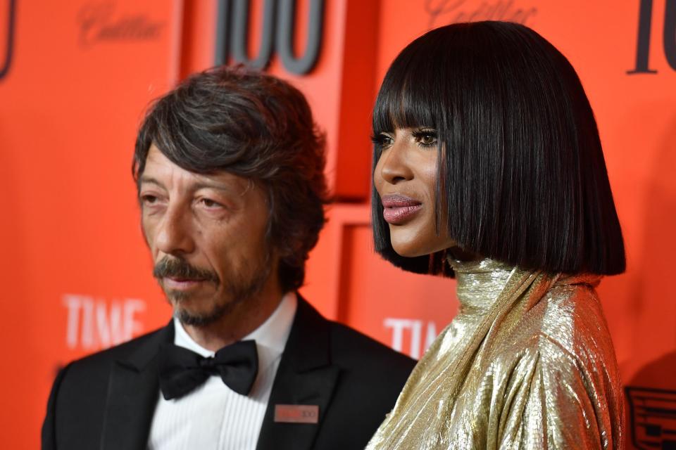 Naomi Campbell, right, and Italian fashion designer Pier Paolo Piccioli arrive(AFP/Getty Images)