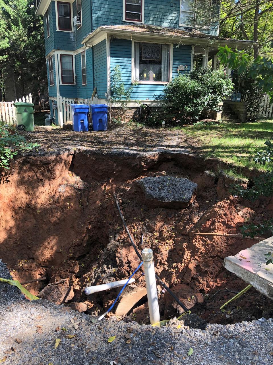 The sinkhole at 271 Montford Ave. started out small in July 2021 but was over 20 feet wide by mid-October.