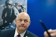 U.S. Federal Aviation Administration administrator Steve Dickson speaks to journalists at the Dubai Airshow in Dubai, United Arab Emirates, Wednesday, Nov. 20, 2019. Dickson said Wednesday that the FAA wouldn't be pressured to rush approvals to allow the troubled Boeing 737 Max to fly again. (AP Photo/Jon Gambrell)