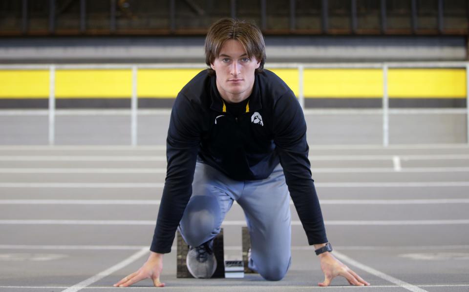 Austin West, a University of Iowa heptathlete, poses for a portrait Wednesday, Nov. 29, 2023 at the Recreation Building on the University of Iowa Campus.