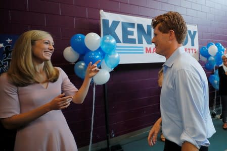 U.S. Rep. Kennedy III is greeted by his wife Lauren after announcing his candidacy for the U.S. Senate in Boston