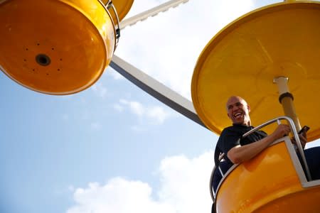 FILE PHOTO: 2020 Democratic U.S. presidential candidate Senator Cory Booker rides the Ferris wheel at the Iowa State Fair in Des Moines