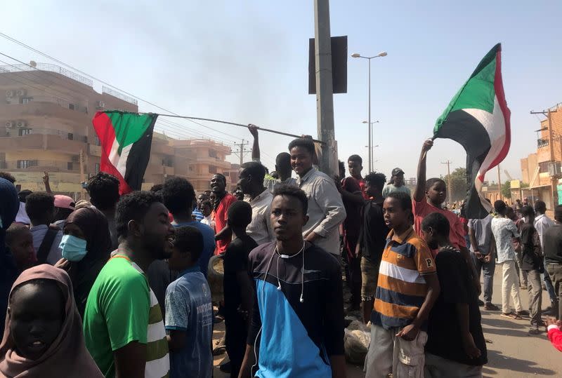 Protesters block a road in Khartoum