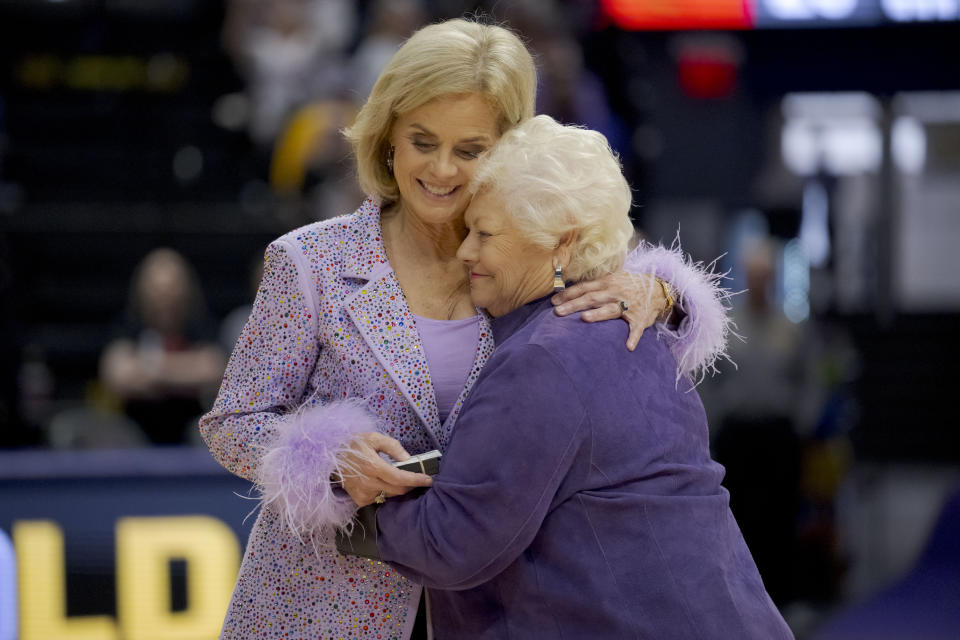 LSU head coach Kim Mulkey honors her former Louisiana Tech coach Sonja Hogg as she gave all of her former coaches LSU national championship rings during halftime of an NCAA basketball game against Mississippi Valley State on Sunday, Nov. 12, 2023 in Baton Rouge, La. (AP Photo/Matthew Hinton)