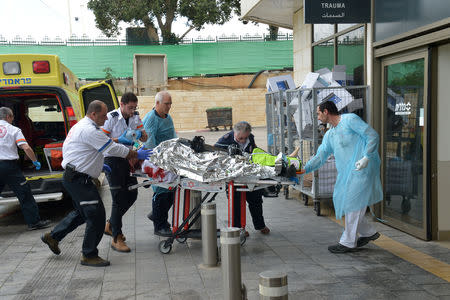 A injured person is rushed into hospital, following an incident at the entrance to the Jewish settlement of Ariel in the occupied West Bank, in Petach Tikva, Israel March 17, 2019. REUTERS/Yossi Zeliger