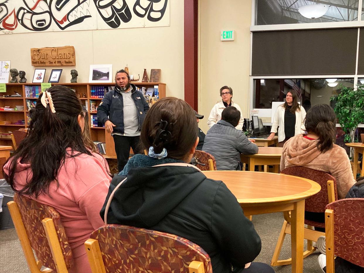 Luis and Danielle Castillejo and North Kitsap High School principal Megan Sawicki, left to right, spoke at a meeting discussing discrimination against Latino parents and students in the school's library on Tuesday.