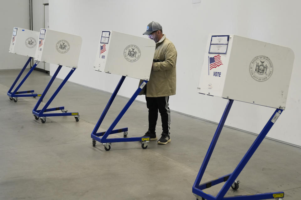 A voter fills out his ballot at a polling site in Manhattan, New York, Tuesday, April 2, 2024. New York is among four states casting their ballots in the 2024 presidential primary; both President Joe Biden and former President Donald Trump already have enough delegates to secure their parties' nominations. (AP Photo/Seth Wenig)