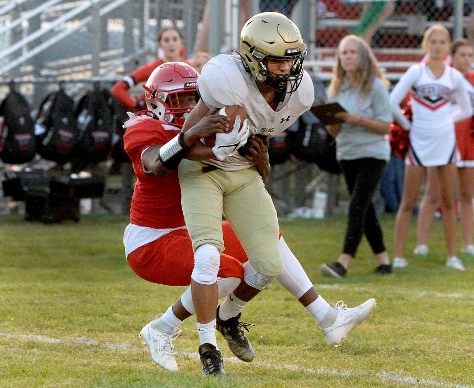 Sacred Heart-Griffin's Christian Pollard scores a touchdown during the game against Jacksonville Friday, Sept. 8, 2023.