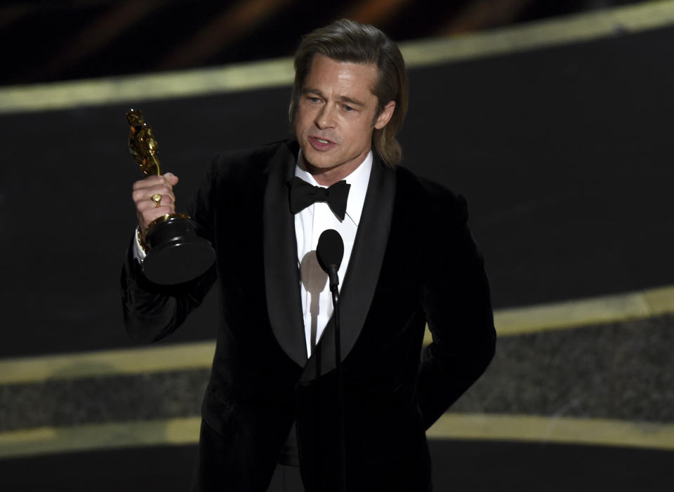 Brad Pitt accepts the award for best performance by an actor in a supporting role for "Once Upon a Time in Hollywood" at the Oscars on Sunday, Feb. 9, 2020. (AP Photo/Chris Pizzello)