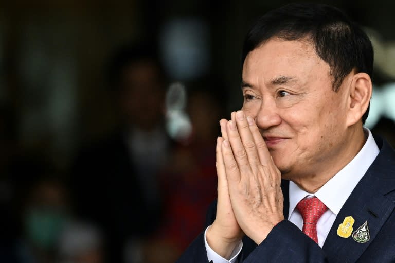 Former prime minister Thaksin Shinawatra, the patriarch of the Pheu Thai party that leads the coalition government, is accused of lese-majeste over an interview he gave to South Korean media in 2015 (Manan VATSYAYANA)