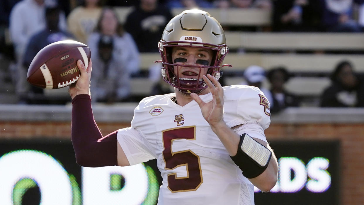 Boston College quarterback Phil Jurkovec (5) looks to pass against Wake Forest during the first half of an NCAA college football game in Winston-Salem, N.C., Saturday, Oct. 22, 2022. (AP Photo/Chuck Burton)