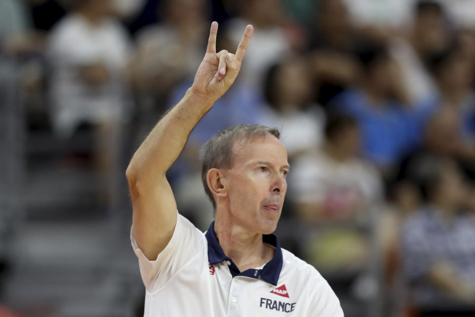 France's coach Vincent Collet gestures during a quarterfinal match against United States for the FIBA Basketball World Cup in Dongguan in southern China's Guangdong province on Wednesday, Sept. 11, 2019. France defeated United States 89-79. (AP Photo/Ng Han Guan)