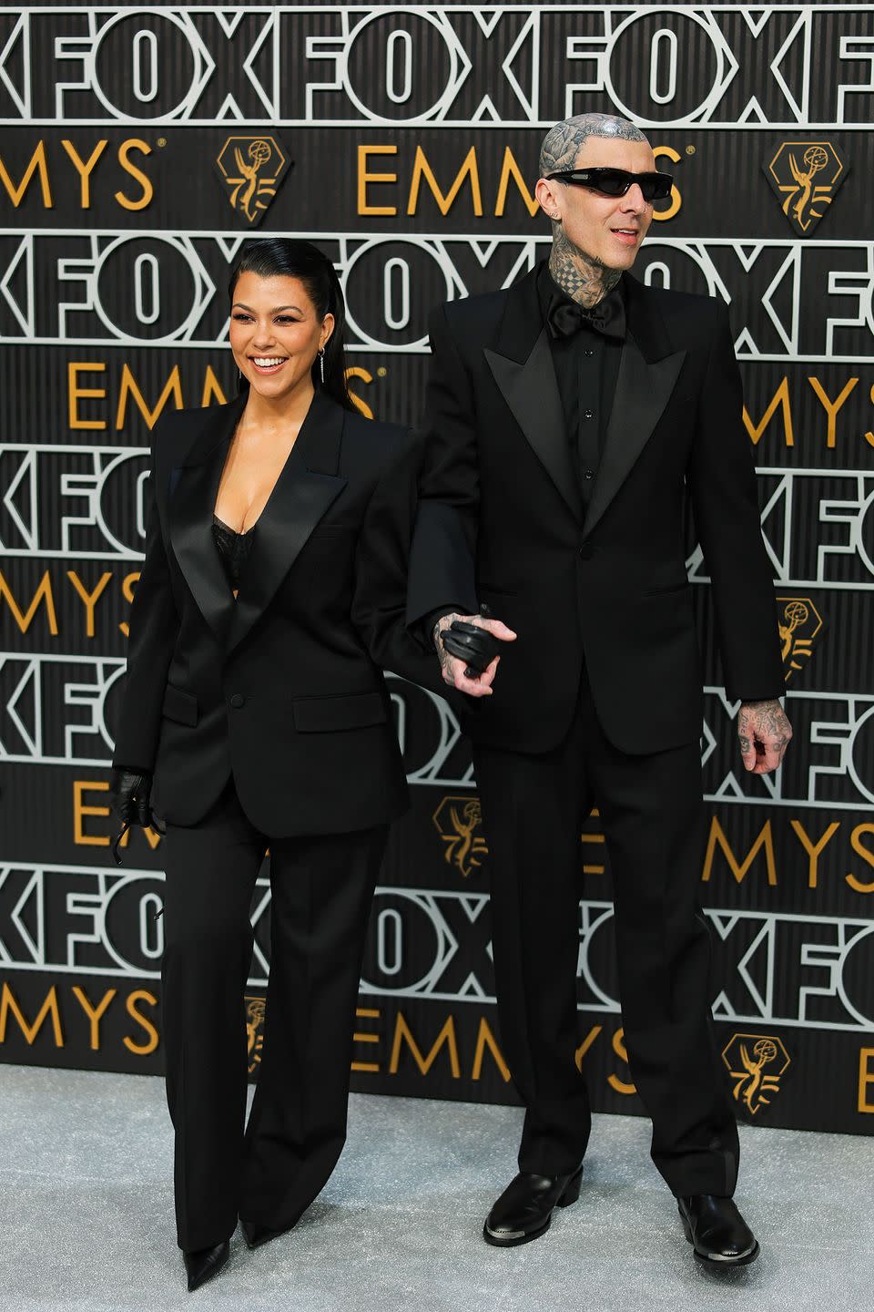 los angeles, california january 15 l r kourtney kardashian and travis barker attend the 75th primetime emmy awards at peacock theater on january 15, 2024 in los angeles, california photo by neilson barnardgetty images