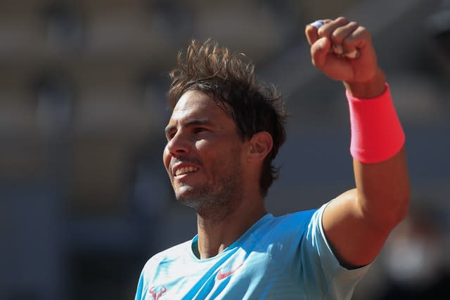 Rafael Nadal punches the air after victory