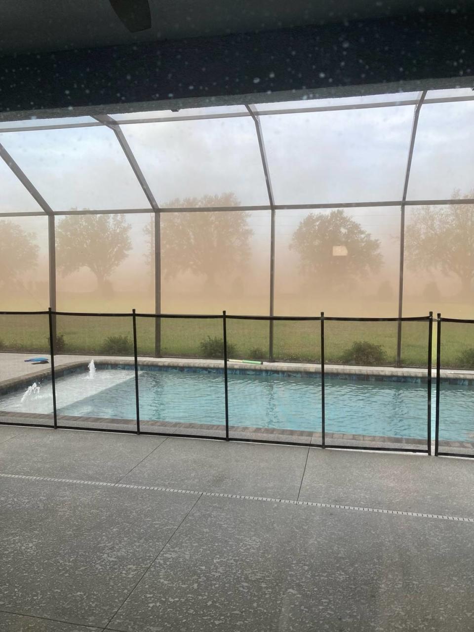 Foxbrook residents said dust from the Rye Ranch construction site is covering their homes. A provided photo shows dust blowing through the air in a neighbor’s backyard.