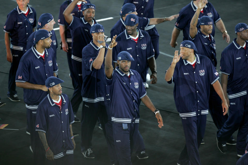 LeBron James (center) and other Members of the United States' Olympic team during the Parade of Nations at the Opening Ceremonies of the Athens 2004 Olympic Games at Olympic Stadium on August 13, 2004. (Photo by Allen Kee/WireImage)